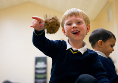 A child smiling and learning